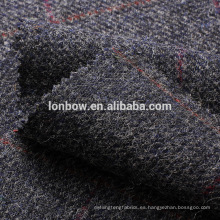 Paño de lana de tweed de lana azul marino sobrepasa el cristal de la capa deportiva